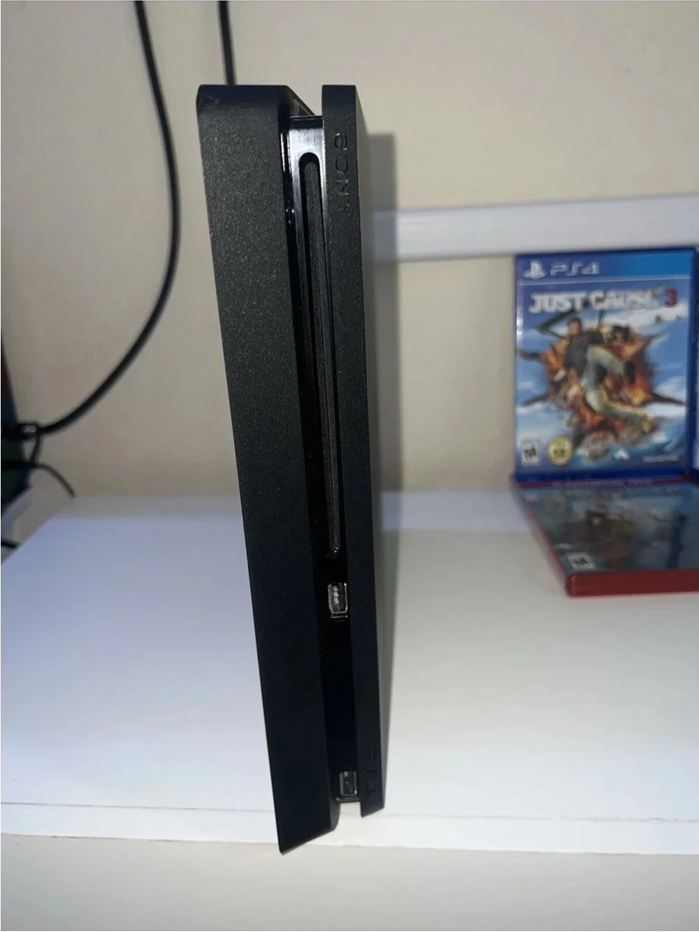 Sony Play S 4 Slim 500GB Gaming Console with 2 Controllers,15 Games, And Charger